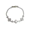 Pulseira Europeia e Americana Transfronteiriça Exquisite Fashion Leve Luxo Zircônia Concha Flor de Quatro Folhas, Joia Personalizada Simples de Alta Gama Super Brilhante