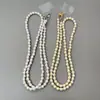 Ins Cadena de Perlas de Lujo Ligero Avanzado Clip para Teléfono Móvil Correa Universal Cadena Larga Cruzada para Colgar en el Cuello de Cámara CCD para Mujeres