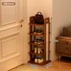 Un zapatero pequeño y estrecho para entradas, un estante de almacenamiento de varias capas para el hogar, un organizador de zapatos de bambú simple y que ahorra espacio