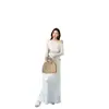 Elegante conjunto de top y falda de base con un solo hombro, encaje recortado y plisados, nueva colección otoño 2026, ropa elegante para mujer