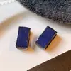 Modernos y Minimalistas Brazaletes para Oreja Retorcidos de Piedra Ojo de Tigre para Mujer, Pendientes Versátiles Vintage, Accesorios para Orejas de Otoño e Invierno con un Toque de Lujo Ligero y de Alta Gama