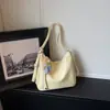 Bolsa Retrô de Grande Capacidade para o Dia a Dia de Mulheres 2026 Nova Coleção de Primavera Bolsa de Ombro Transversal Casual Mochila Multifuncional
