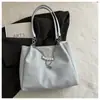 Bolsas Femininas Atacado Primavera 2026 Novo Versátil Estilo Executivo Corrente de Pérola Texturizada Grande Capacidade Casual Bolsa de Ombro Tote