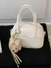 Bolsa de mão texturizada de alta qualidade para mulheres, nova bolsa de ombro da moda 2026 com padrão de lichia, bolsa transversal pequena quadrada