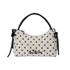 Bolso de mano de lunares estilo coreano para mujer, nuevo modelo 2026, alto valor estético, bolso de hombro simple, bolso cruzado de moda y versátil