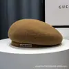 Boina de lana británica para mujer, otoño e invierno, celebridad de internet, elegante, blanca, sombrero de pintor, que estiliza la cara, gorro de boina de punto de lana de cordero