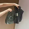 Camisa a cuadros elegante de calidad premium para niños, nuevo estilo 2026, camiseta sin mangas de verano estilo coreano para niños