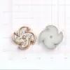 ABS estilo coreano blanco y negro trébol de cuatro hojas DIY pegamento de crema accesorios para joyería pequeños accesorios pendientes pasador de pelo agujero material para zapatos