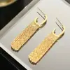 Novos brincos longos de franja de alto padrão para o verão de 2024, brincos femininos com temperamento europeu e americano, brincos de cobre com zircônia incrustada, atacado