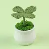 Planta de interior popular de trébol de cuatro hojas artificial, planta verde artificial tejida, artículo decorativo creativo de alto valor, regalo de la suerte, venta al por mayor desde el fabricante