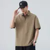Camisa polo casual de estilo americano con media cremallera para hombre, ajuste holgado de verano con hombros caídos, tacto de alta gama, camiseta tipo pullover holgada de manga corta