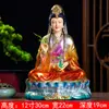 A estátua de Buda de Miaoshan Guanyin Bodhisattva é venerada na imitação de mármore branco, Guanyin Bodhisattva do Mar da China Meridional, sentada em lótus em casa e cuidando do Taoísta