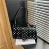Bolsa de Mão Minimalista com Bolinhas de Nicho 2026 Novo Estilo Bolsa de Ombro para Sob o Braço Bolsa de Ombro da Moda para o Dia a Dia Feminina Tendência Transfronteiriça