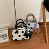 Bolso cruzado, otoño 2026, bolso de mano de lunares, bolso de trabajo para mujer, diseño versátil, nueva versión coreana, bolso de bolos de nicho