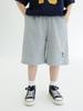 Pantalones casuales holgados de verano 2024 para niños, pantalones cortos deportivos bordados de estilo occidental de cinco puntos para niños grandes