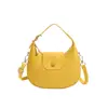 Bolso de mano pequeño retro Yaozi para mujer, nuevo estilo 2026 bolso de mano con forma de media luna, bolso de hombro versátil y simple, bolso de axila tipo empanadilla