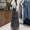 Saia casual boêmia com estampa vintage de outono para mulheres, saia longa com cintura elástica, roupa feminina versátil, saia com barra ampla e fluida