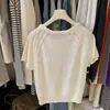 Nuevo Estilo 2026 Recomendado para Principios de Primavera: Top de Verano de Punto de Color Sólido, Cuello Redondo Simple, Manga Corta, Calado, Ajustado