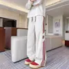 Calça Casual Larga com Três Listras Tendência Americana Masculina 2026 Primavera/Outono Novo Adolescente Estudante Solta Longa