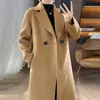 Abrigo de lana de color liso cruzado de doble botonadura para mujer, estilo largo elegante de otoño e invierno, prenda exterior ajustada hasta la rodilla al por mayor