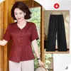 Blusa de Cetim de Verão para Mãe de Meia-Idade 2026 Novo Estilo Decote V Manga Curta Top Jovial para Mulheres de Meia-Idade e Idosas Atacado