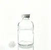 Botella Dispensadora Transparente Minimalista de 50 ml con Cierre a Presión y Cabezal de Bomba Spray a Prueba de Polvo, Botella de Vidrio Portátil para Viaje a Prueba de Luz para Agua de Rosas Pura
