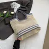 2026 Nuevo Estilo Bolso Tejido de Playa para Vacaciones en la Costa para Mujeres, Bolso de Mano de Punto Hueco, Bolso de Hombro de Gran Capacidad
