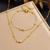 Colgante de Lazo Incrustado de Diamantes de Moda y Sencillo con Cadena Fina, Set de Joyería Bañado en Oro de Acero Inoxidable, Exquisito Set de Dos Piezas para Mujer