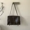 Moda Simple Retro Nicho Bolso de Hombro Único Tendencia Coreana Color Sólido Bolso Tote de Mano para Mujer Invierno 2025
