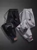 Pantalones casuales al por mayor para hombre otoño e invierno forrados de polar engrosados pantalones deportivos para hombre pantalones de punta suelta una generación de pelo