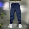 Pantalones Casuales de Moda para Hombre con Forro de Felpa Otoño/Invierno 2026, Versátiles de Alta Calidad para el Día a Día, Pantalones Elegantes y Sencillos de Corte Ajustado