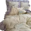 Estilo ins, fresco y simple, juego de ropa de cama de cuatro piezas de algodón puro, diseño de princesa estilo coreano, algodón lavado, estampado floral, ribete floral grande, juego de tres piezas apto para estudiantes