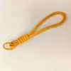 Llavero de cordón para teléfono móvil a juego de colores simple corto universal creativo adornos tejidos a mano cuerda anti-pérdida para altavoz de hervidor