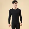Nuevo conjunto térmico de camelia para otoño e invierno, alta elasticidad y comodidad, conjunto de capa base para calor y protección contra el frío, venta al por mayor de tops y pantalones de otoño