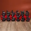 Adornos tallados de ébano, Ratón, Vaca, Tigre, Conejo, Dragón, Serpiente, Caballo, Oveja, Gallo, Mono, Perro, Cerdo, Lingote, Doce Signos del Zodíaco, un Conjunto de Artesanías