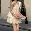 Vestido beige de encaje sin mangas con cuello halter, espalda descubierta, suelto para mujer, nuevo vestido corto de línea A para otoño 2026 con tiras de amarre