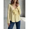 Outono Europeu e Americano 2026 Nova Moda Feminina Top Texturizado com Gola V Laço e Manga Sino