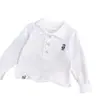 Ropa Infantil Osito 2025 Nueva Primavera y Otoño Camiseta de Algodón Judy para Niños de Dos Colores Soporta Envío Directo de una Pieza Bordado de Color Sólido