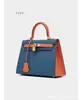2025 Bolso Kelly Bloque de Color Bolso de Mano de Cuero Genuino Bolso de Hombro de Piel de Vaca Estampada en Palma Bolso Cruzado Moda Simple Transfronteriza
