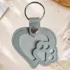 Llavero con Forma de Corazón y Huella de Gato para Guardar Pelo de Mascotas Colgante Recuerdo de Pelo de Cuero PU Decoración Portátil para Bolsa Venta al por Mayor