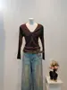 Suéter de punto de cuello redondo con mangas largas retorcidas de rayas verticales para otoño e invierno para mujer, principios de otoño, súper caliente, nicho, estilo único, top