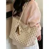 2026 Nova Bolsa Tote Elegante Simples Vazada Transfronteiriça, Bolsa de Ombro Casual Versátil para Mulheres, Bolsa Feminina de Grande Capacidade