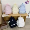 Mochila de estilo ins coreano estilo universitario con lunares de alta apariencia para estudiante de secundaria, mochila de viaje dulce estilo chica suave con encaje
