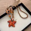 Collar Largo de Madera con Estrellas de Mar y Cuentas Estilo Bohemio Retro Vacaciones en la Costa Estilo Étnico Personalidad Verano Accesorios para Mujer