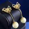 Estilo Europeo y Americano Familia D Moda Retro Completamente Incrustados de Diamante Lazo Cadena de Cuentas Metálicas Redondas Pequeñas Borla Aretes Largos de Perla para Mujeres
