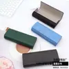 Venta al por mayor de fábrica, diseña y produce estuches para gafas de nuevo estilo, cuadrados estilo coreano, para miopía, resistentes a la presión, portátiles, modernos, frescos, tela con logo impreso