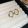 Pendientes de Botón Ovalados de Resina Transfronterizos Europeos y Americanos Pendientes Maillard de Otoño e Invierno Pendientes Simples de Moda Versátiles para Mujer Sensación de Alta Gama