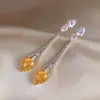 Pendientes de plata chapada en oro real de 18 quilates con aguja de plata y colgante de gota de agua de circón, lujo ligero con un toque de alta gama, diseño único y de nicho