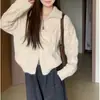 Suéter cárdigan con cuello alto y cremallera retorcida para mujer 2025 Nuevo estilo perezoso de otoño e invierno Chaqueta de punto con cuello alto
