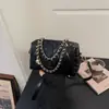 Moda diaria estilo coreano transfronteriza cadena acolchada 2026 moderna y elegante bolso de hombro cruzado con cadena bolso tipo almohada